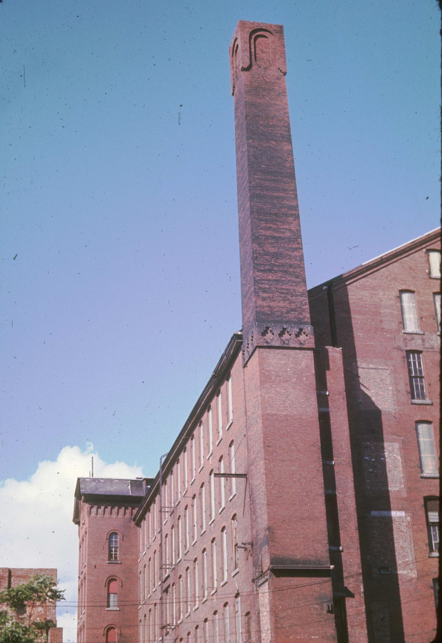 Photograph of the chimney and southwest corner of the mill.